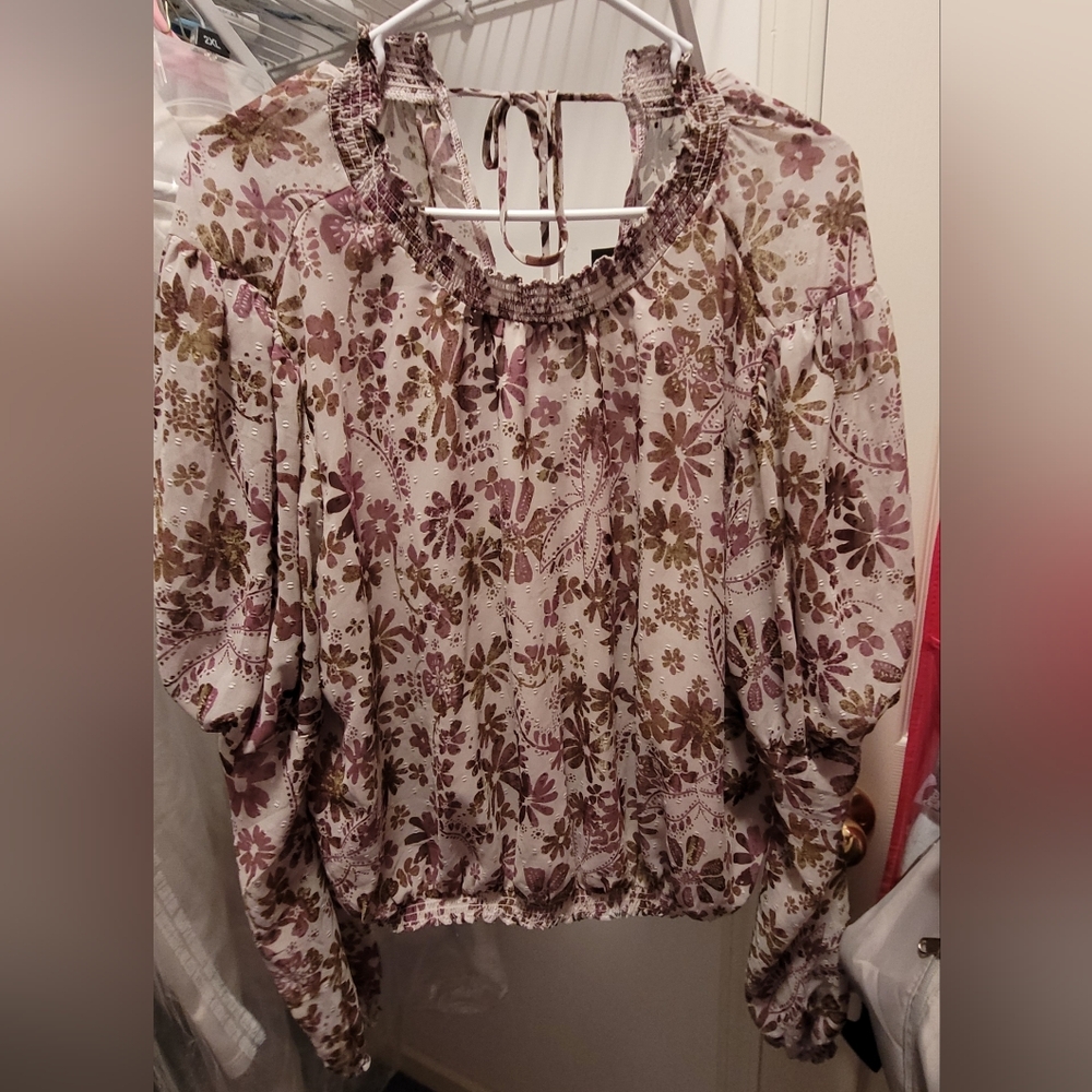 NWOT FREE PEOPLE LARGE FLORAL PRINT TOP SHEER THAT TIES IN BACK. SRP. 80.00